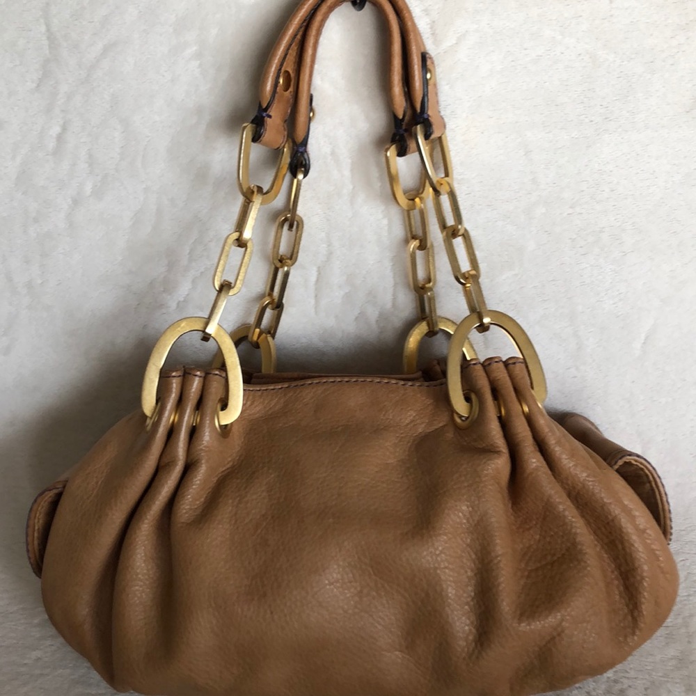 Juicy Couture tan supple leather w/ Charm …